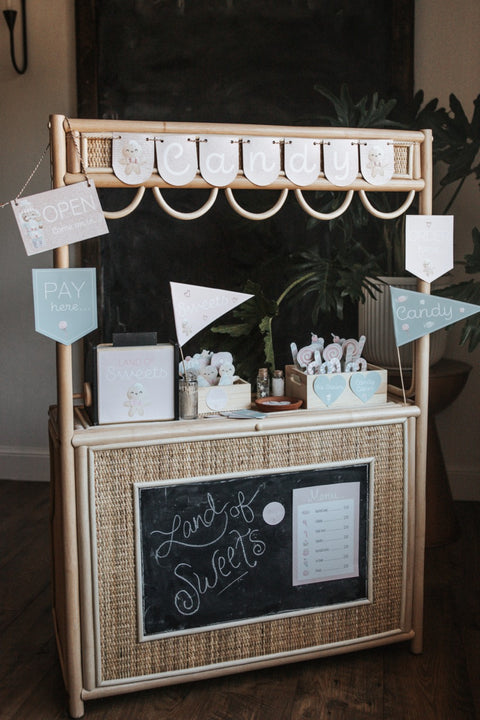 image of a printable treats shop set up on a rattan stand