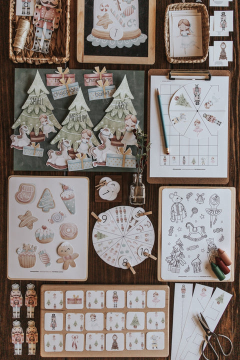 Nutcracker Christmas themed printable activities for preschoolers laid out on table